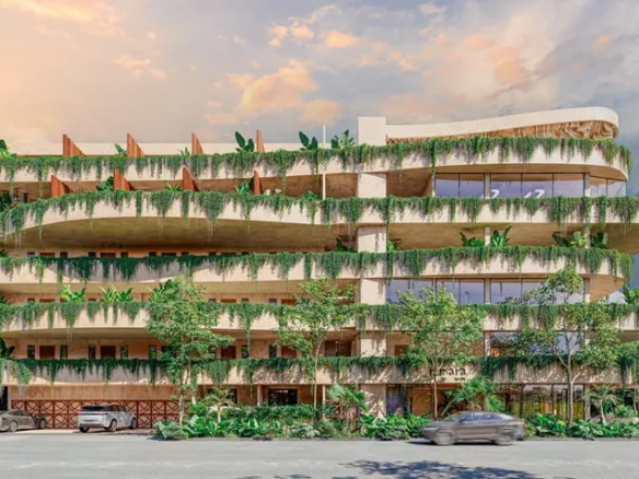 una fachada de un edificio nuevo en amara tulum