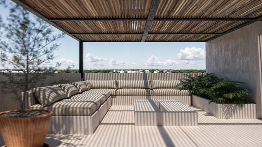 un area de sofas con asoleadero ideal para descansar en macondo punta esmeralda playa del carmen