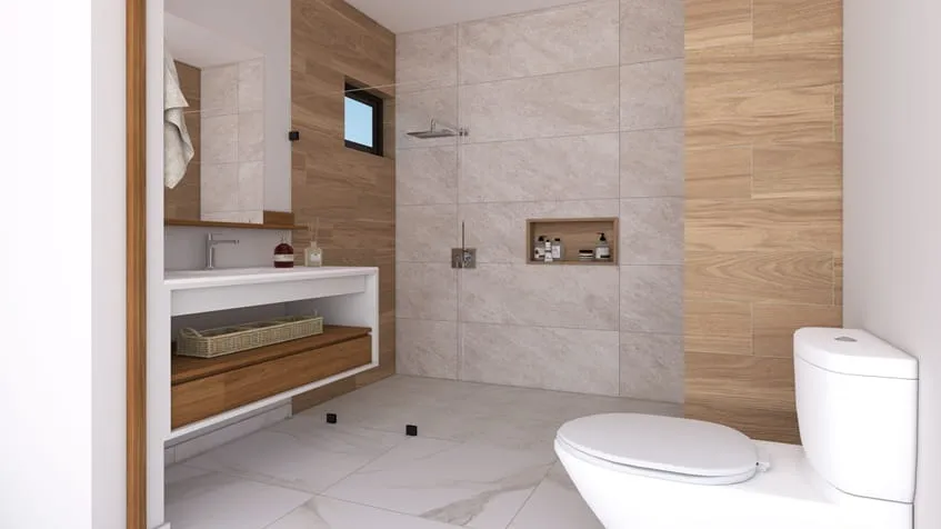 un baño con un lavamanos en ola de mar playa del carmen