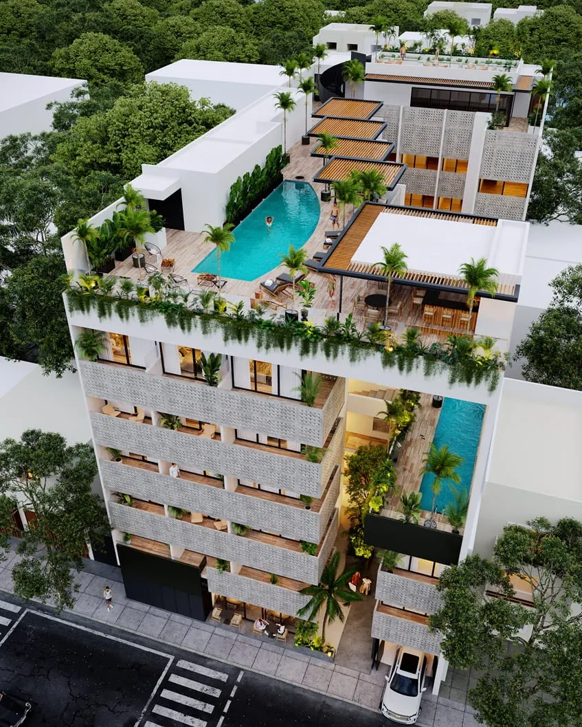fachada-maresol-playa-estudios-playa-del-carmen una vista aerea de un edificio nuevo en maresol playa estudios