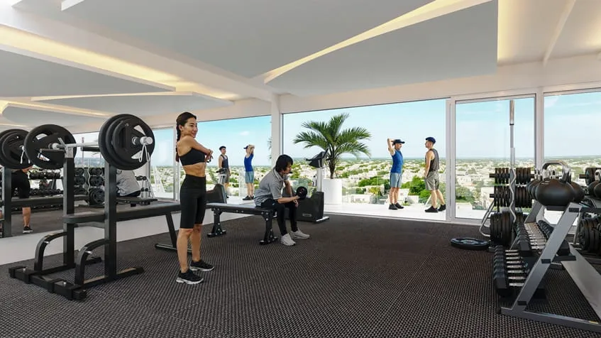 un gimnasio con personas alrededor en menotto 10 playa del carmen