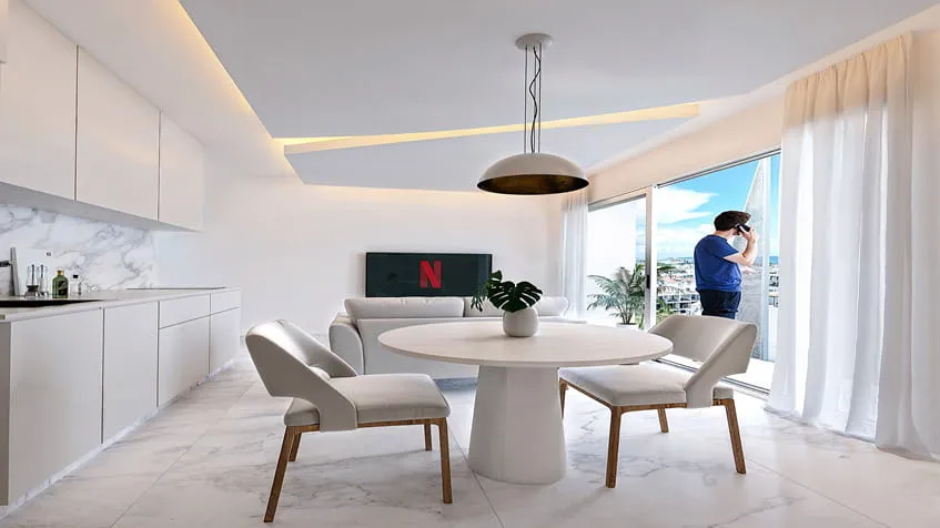 una sala interior con una persona hablando por celular en menotto 10 playa del carmen