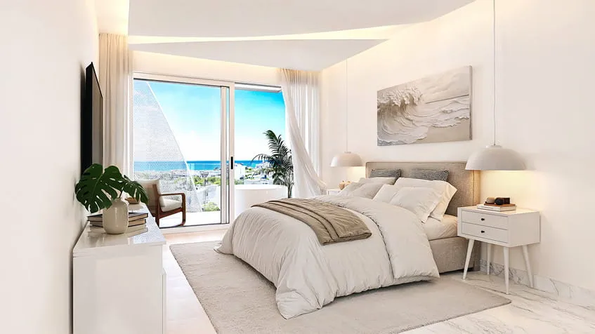 una recamara elegante con una cama queen size en menotto 10 playa del carmen