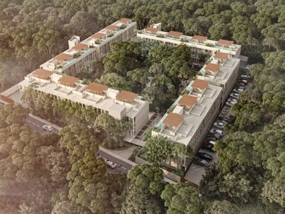 una fachada de un edificio de departamentos en natal tulum